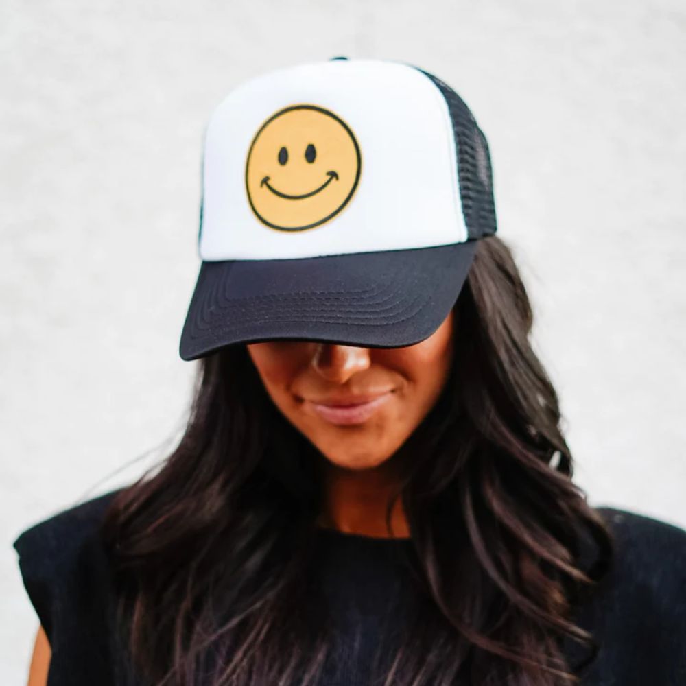 3 Ways To Elevate Your Outfit With a Trucker Hat